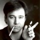 Bill Hicks as a stand-up comedian.